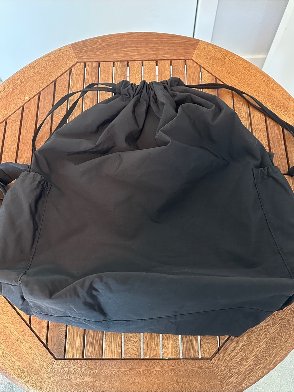 Uniqlo Drawstring Bag in Black - Picture 2 of 14